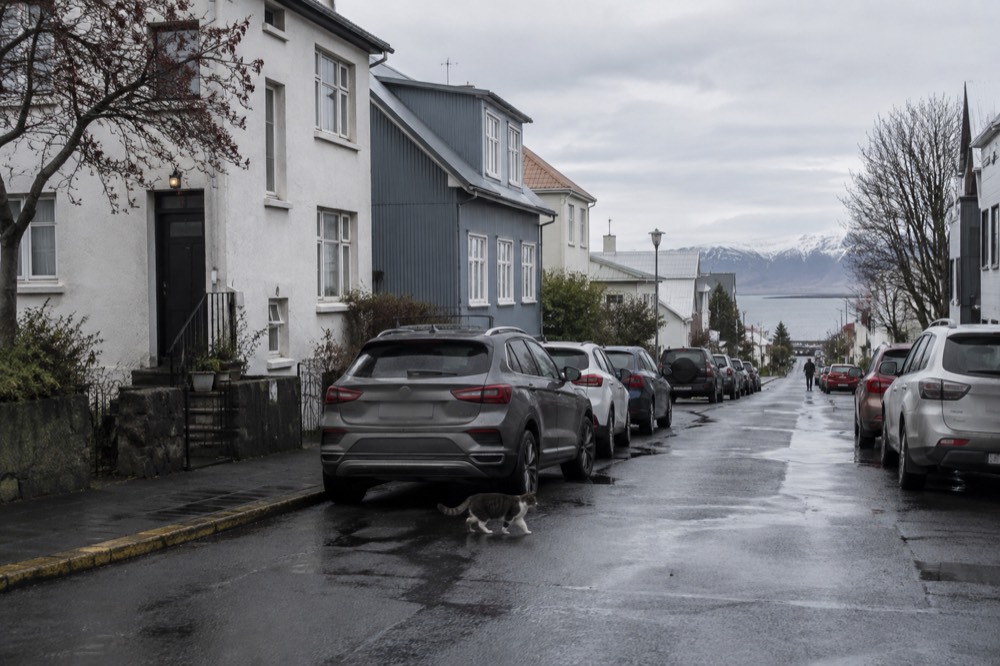 Quiet Reykjavik side street with cars parked and no meters in use